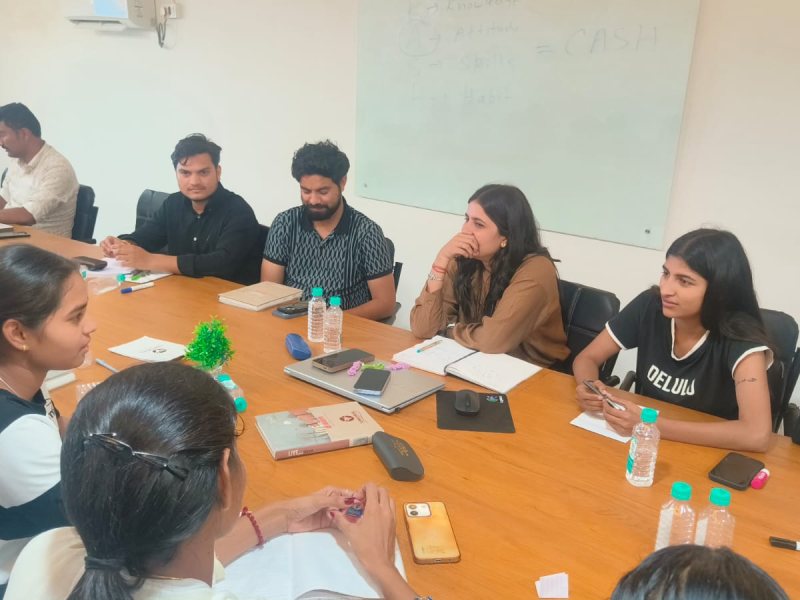Participants sharing ideas around the table